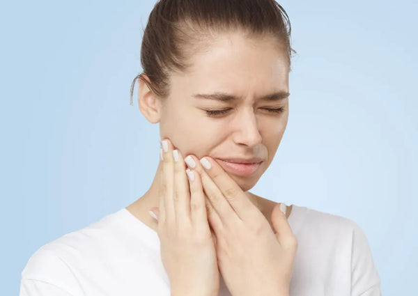 Cómo prevenir las infecciones de encías y dientes